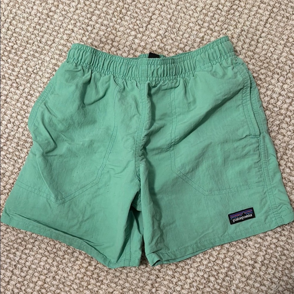 Boys green Patagonia swim trunks, in perfect condition